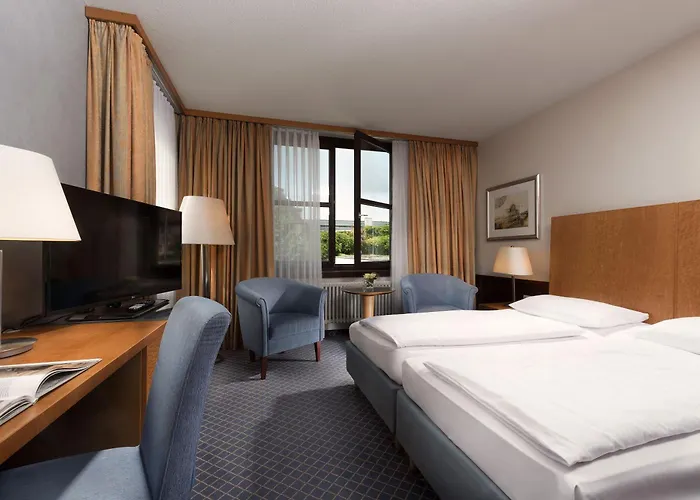 Maritim Am Schlossgarten 호텔 4*